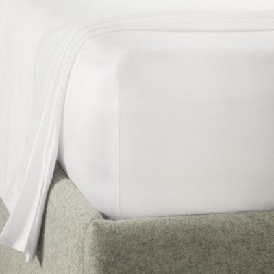 Corner of a white fitted sheet on a grey upholstered bed frame (identical image also used on the Beige listing; does not show light grey)