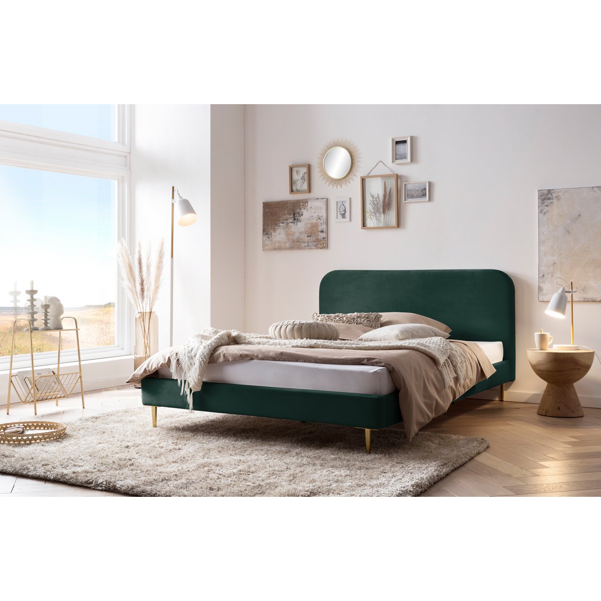 Green velvet upholstered bed 140×200 cm styled in a bright bedroom